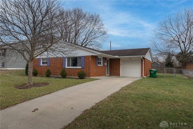 ranch-style home with a garage and a front yard