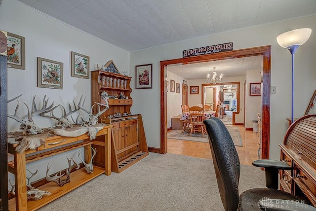 carpeted office featuring a chandelier