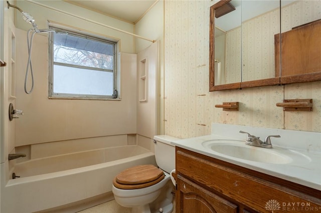 full bathroom featuring vanity, toilet, and washtub / shower combination