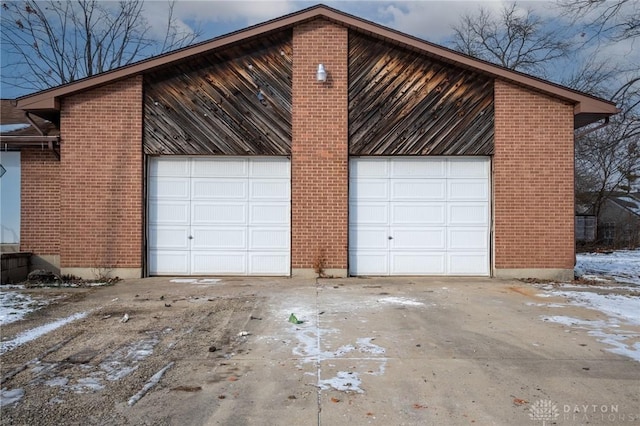 view of snow covered garage