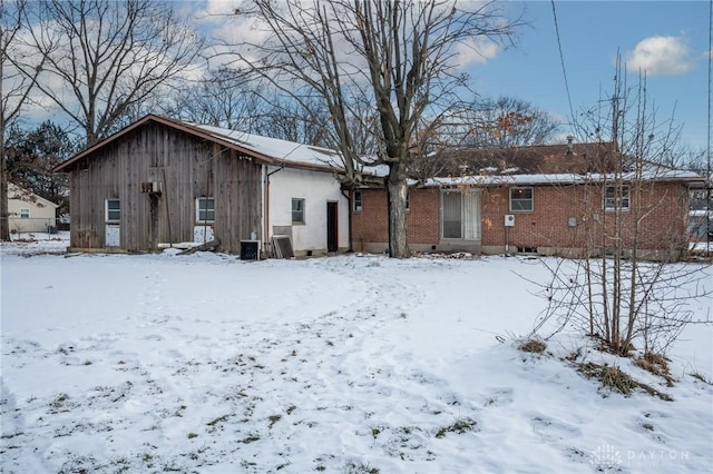 view of snow covered property