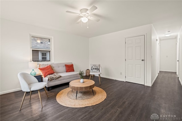 living room with dark hardwood / wood-style floors and ceiling fan