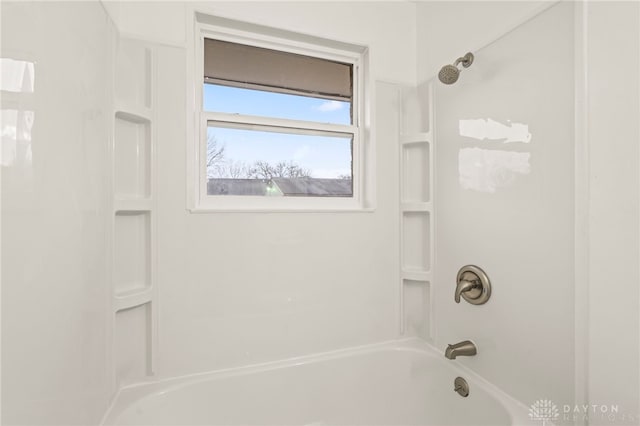 bathroom featuring  shower combination