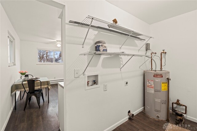 washroom featuring dark wood-type flooring, water heater, washer hookup, a baseboard radiator, and hookup for an electric dryer