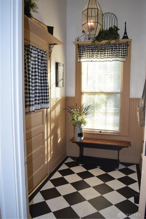2282 Whitey Marshall Dr, Beavercreek, OH 45434 - hallway featuring wainscoting and light flooring