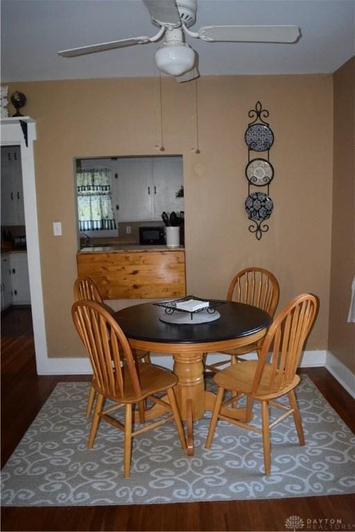 2282 Whitey Marshall Dr, Beavercreek, OH 45434 - dining space with dark wood-type flooring and ceiling fan