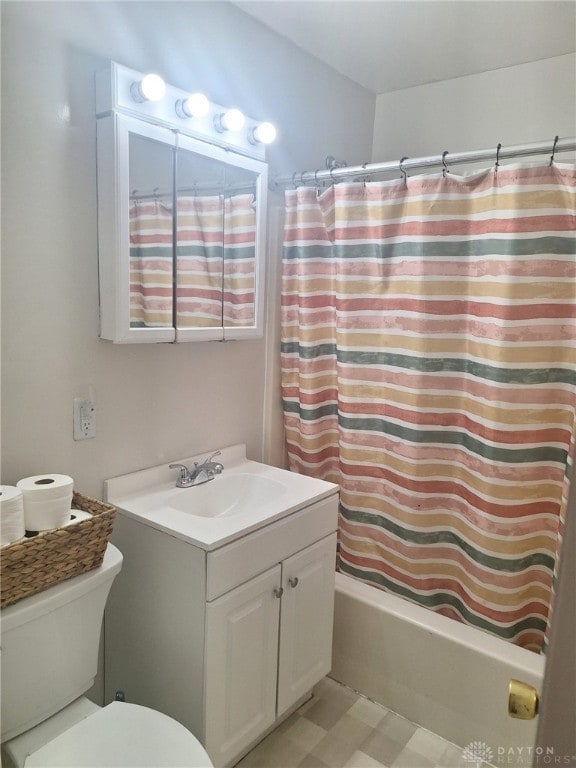 full bathroom featuring vanity, toilet, and shower / bath combo