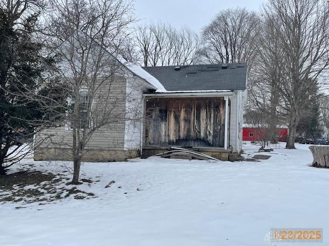 view of snow covered property