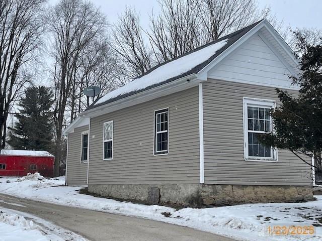 view of snow covered property