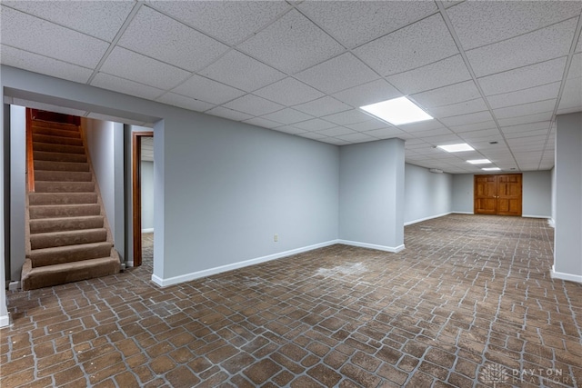 basement with a drop ceiling