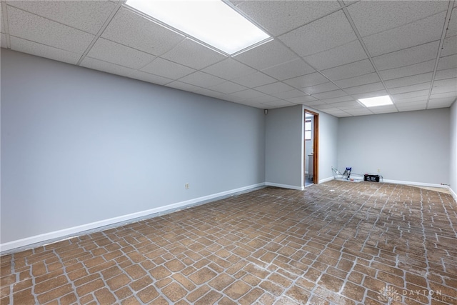 basement with a drop ceiling