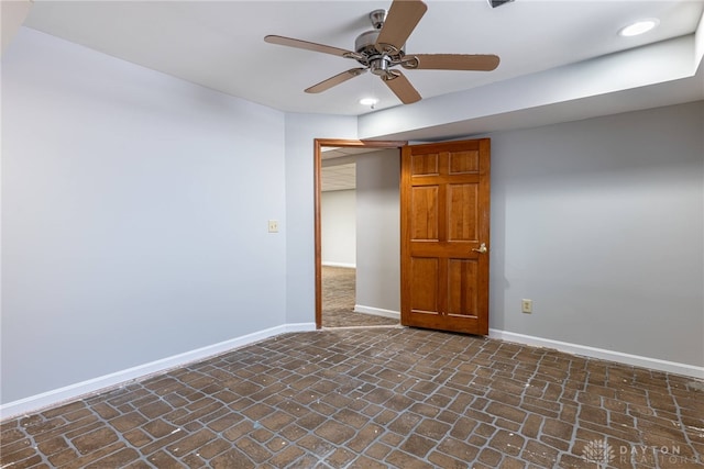 unfurnished room featuring ceiling fan