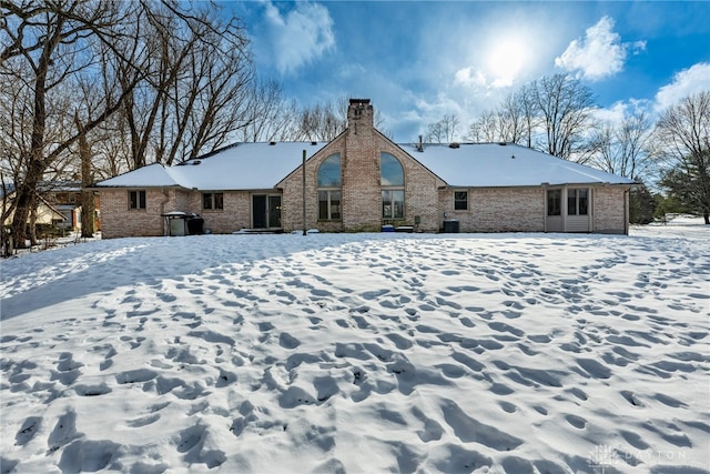 view of snow covered property