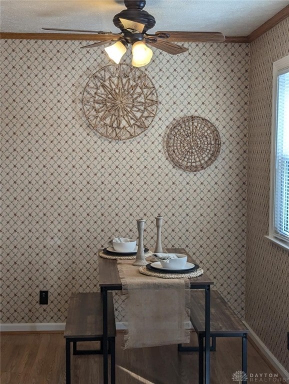 bathroom with ornamental molding and hardwood / wood-style floors