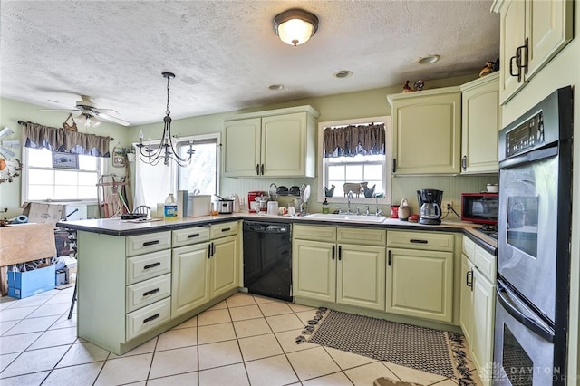 kitchen with pendant lighting, light tile patterned floors, a sink, a peninsula, and black appliances