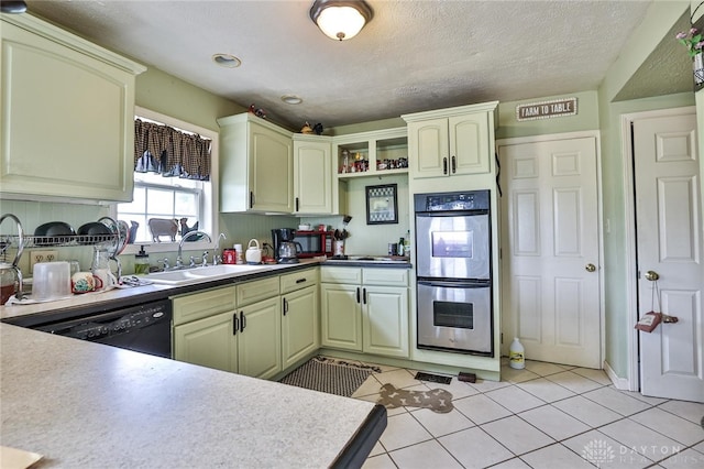 kitchen featuring light tile patterned floors, double oven, a sink, dishwasher, and open shelves