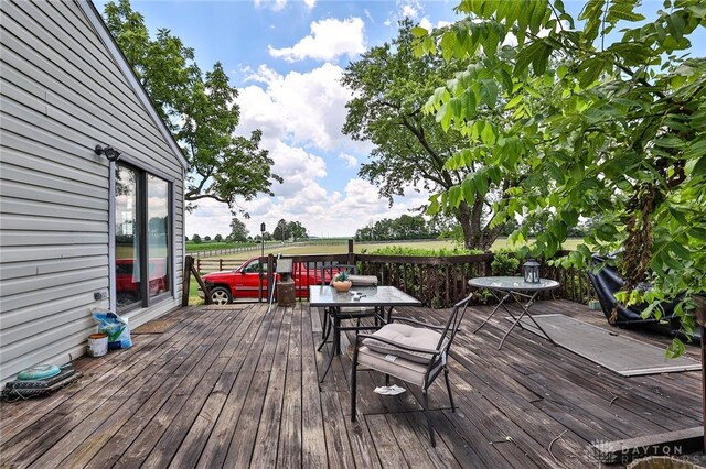 deck featuring outdoor dining area