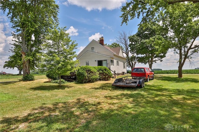 view of yard with a wooden deck