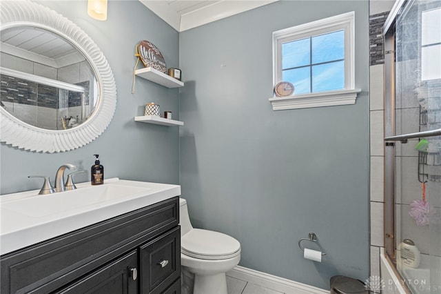 bathroom with toilet, tiled shower / bath combo, vanity, baseboards, and tile patterned floors