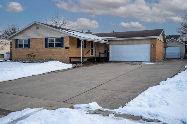 ranch-style house featuring a garage