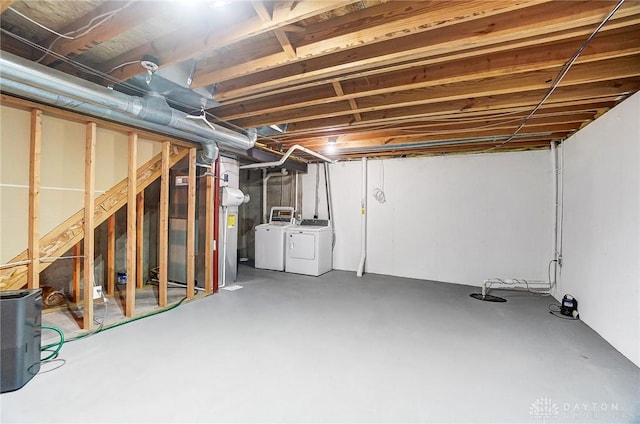 basement featuring separate washer and dryer