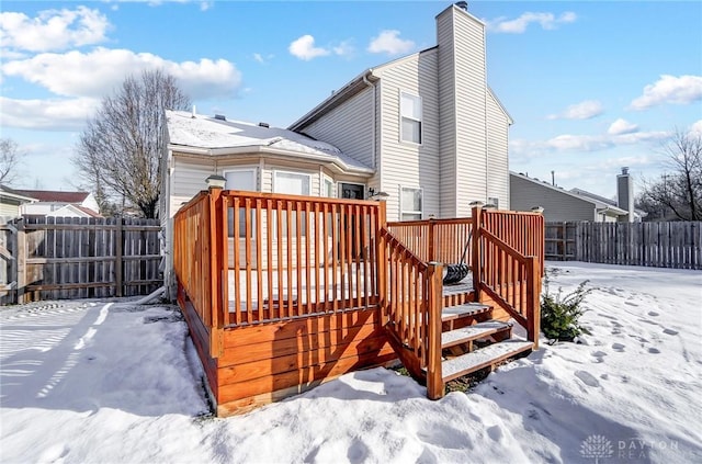 view of snow covered deck