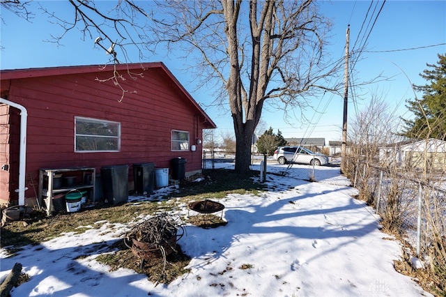 view of snow covered property