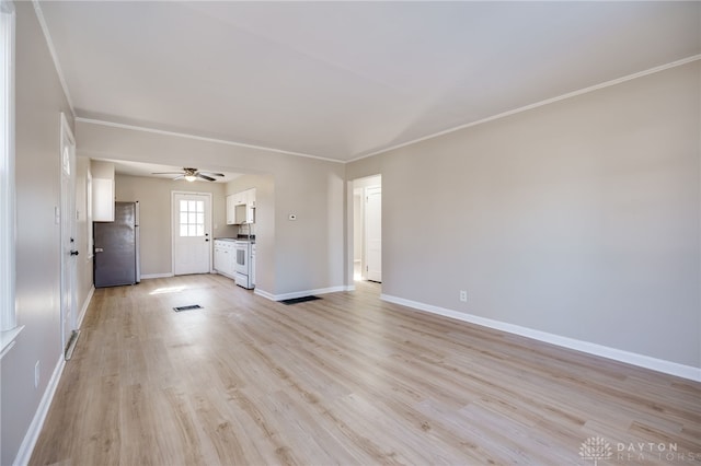 unfurnished living room featuring crown molding, ceiling fan, and light wood-type flooring