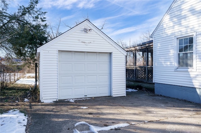 view of snow covered garage