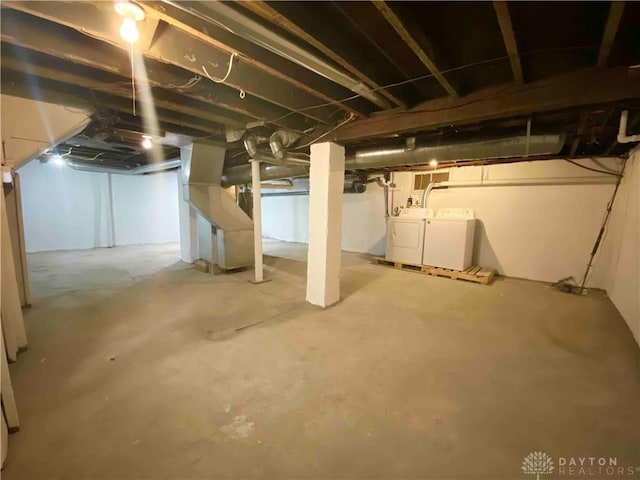 basement featuring washing machine and dryer