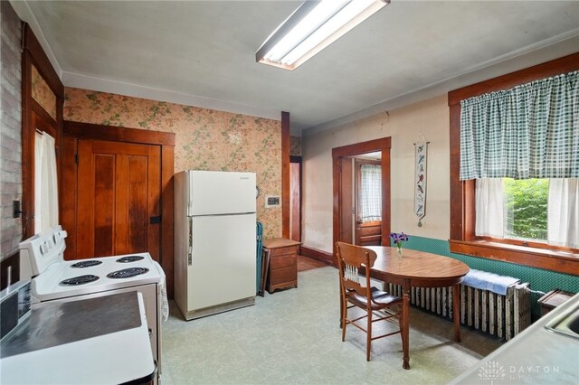 120 E State Route 73, Springboro, OH 45066 - kitchen with white appliances, wallpapered walls, and light floors