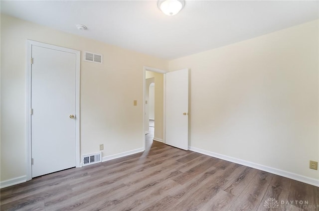 empty room with light wood-type flooring