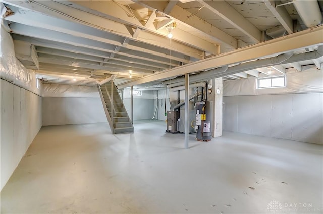 basement featuring gas water heater