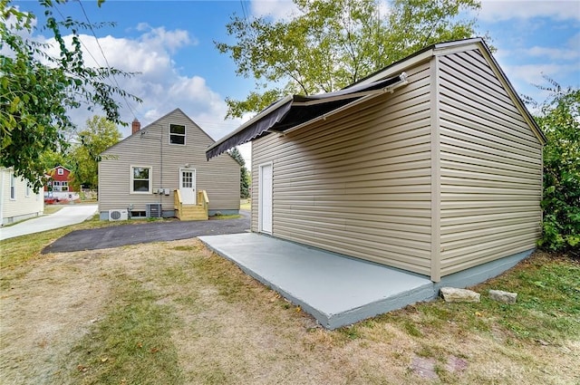 rear view of property with a patio area