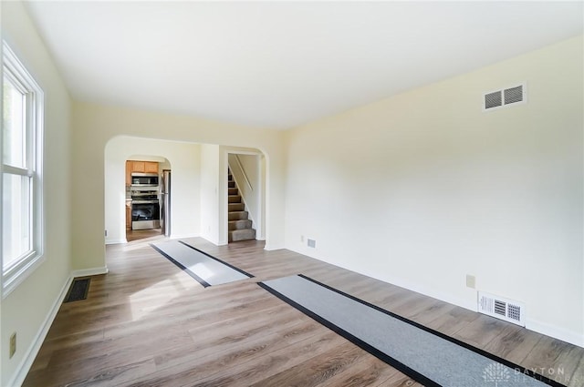 unfurnished room featuring light wood-type flooring