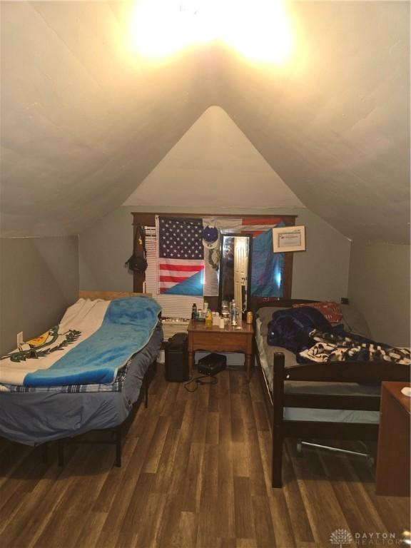 bedroom featuring dark hardwood / wood-style floors