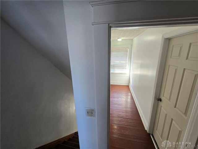 hall with dark hardwood / wood-style floors