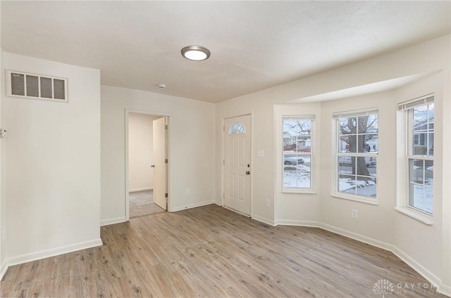 foyer entrance featuring light wood-type flooring