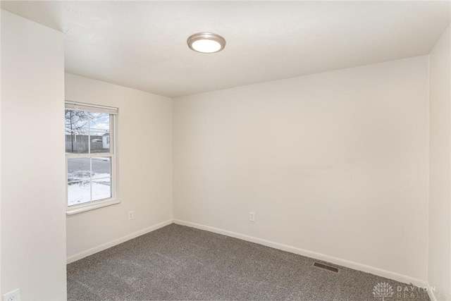 empty room with carpet floors