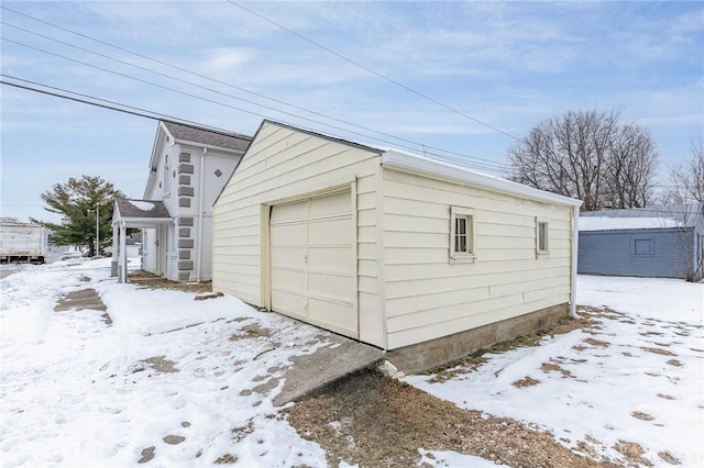 view of snow covered garage