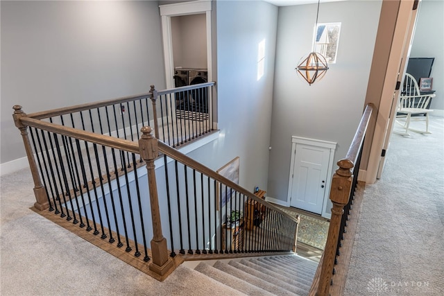 stairway with carpet floors