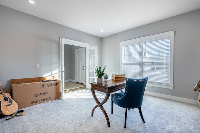 office area with light carpet