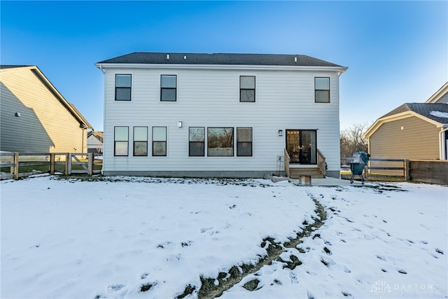 view of snow covered property