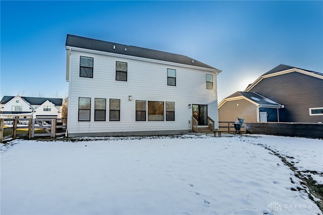 view of snow covered property