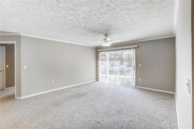 carpeted spare room featuring ceiling fan, crown molding, and a textured ceiling