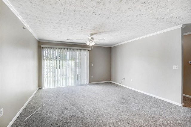 spare room featuring crown molding, carpet flooring, a textured ceiling, and ceiling fan