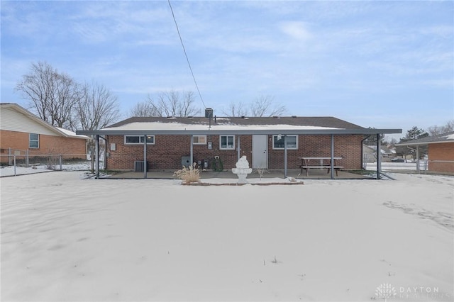 view of snow covered property