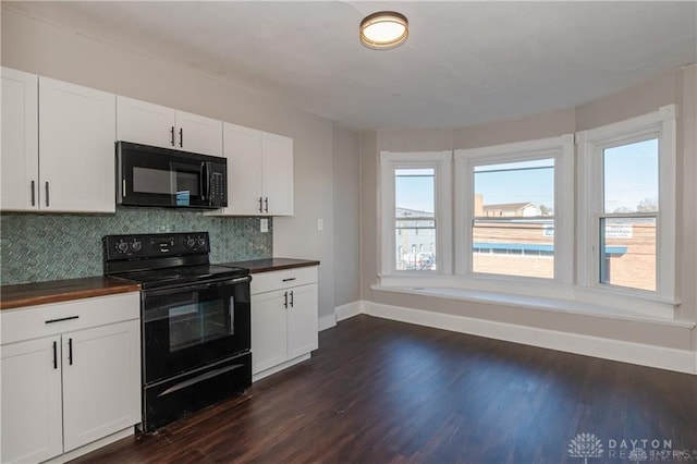 kitchen featuring tasteful backsplash, white cabinets, dark hardwood / wood-style flooring, and black appliances