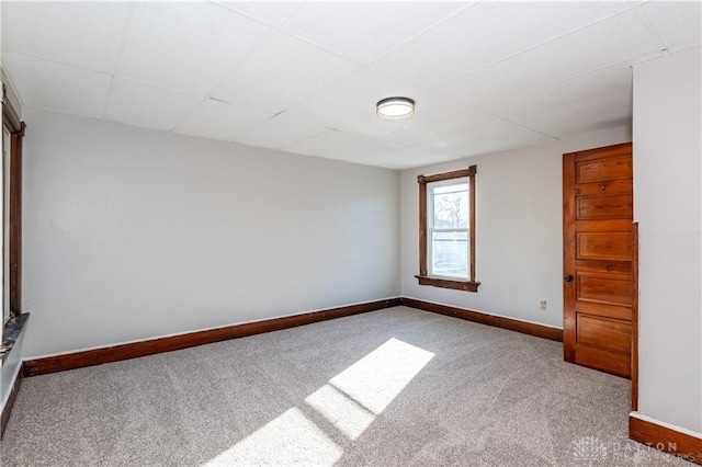 spare room featuring carpet flooring