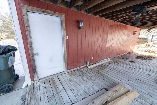 wooden deck with ceiling fan